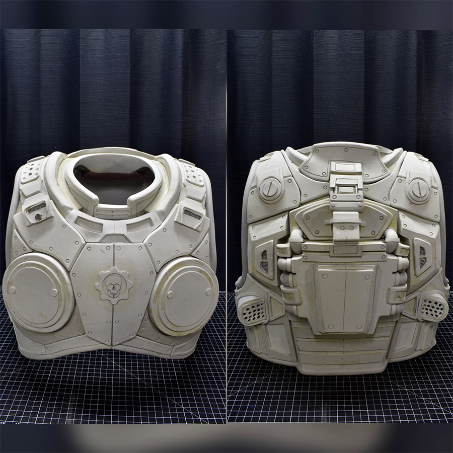 A front and back bust of some unpainted Gears Tactics Armor